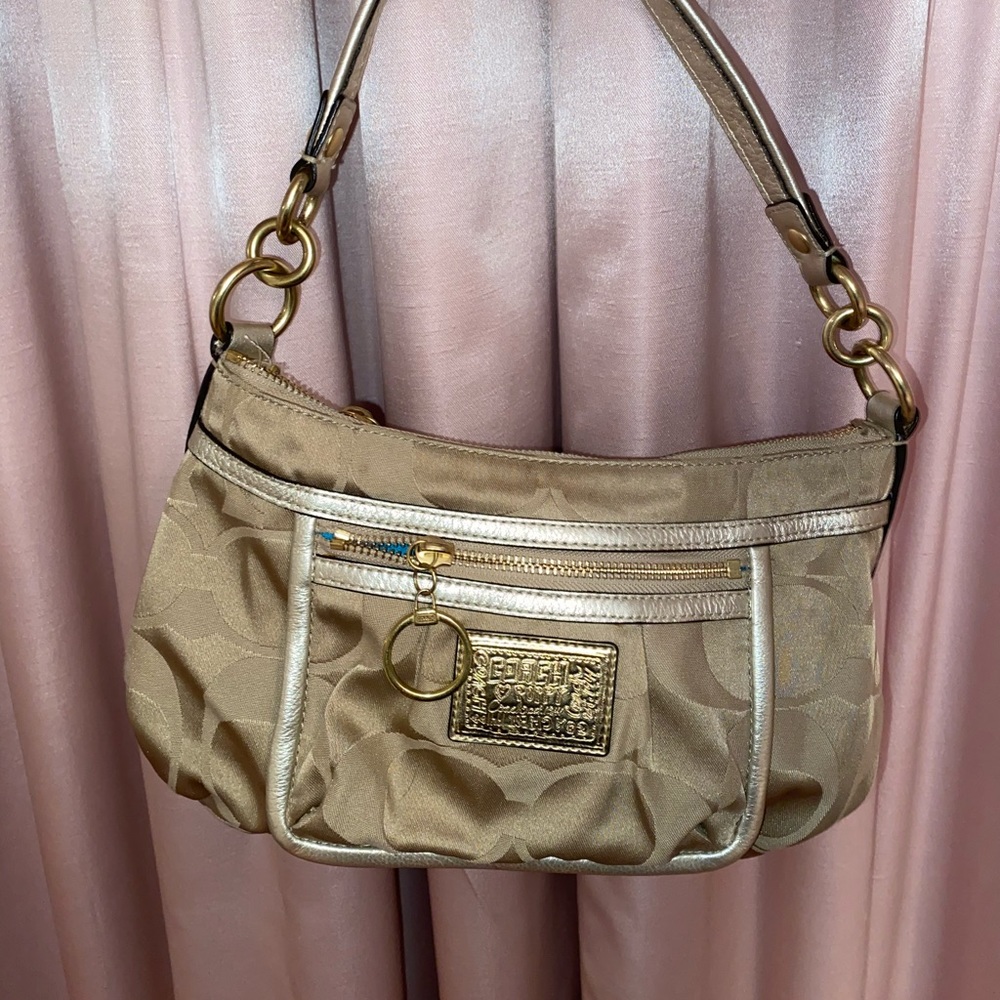 Gold coach handbag